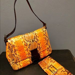 Fendi Orange Python Mama Baguette shoulder bag.